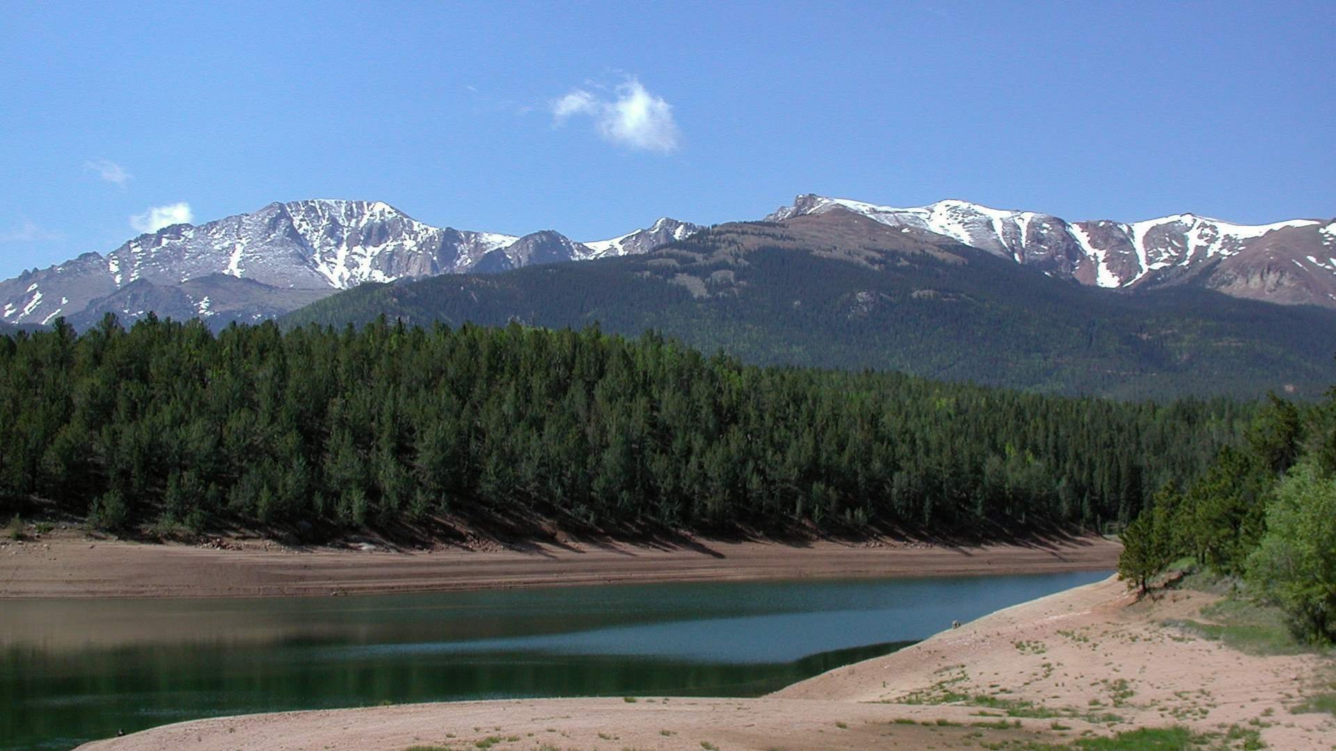 Crystal Reservoir with its banks visible, showing a lower water level in the body of water.