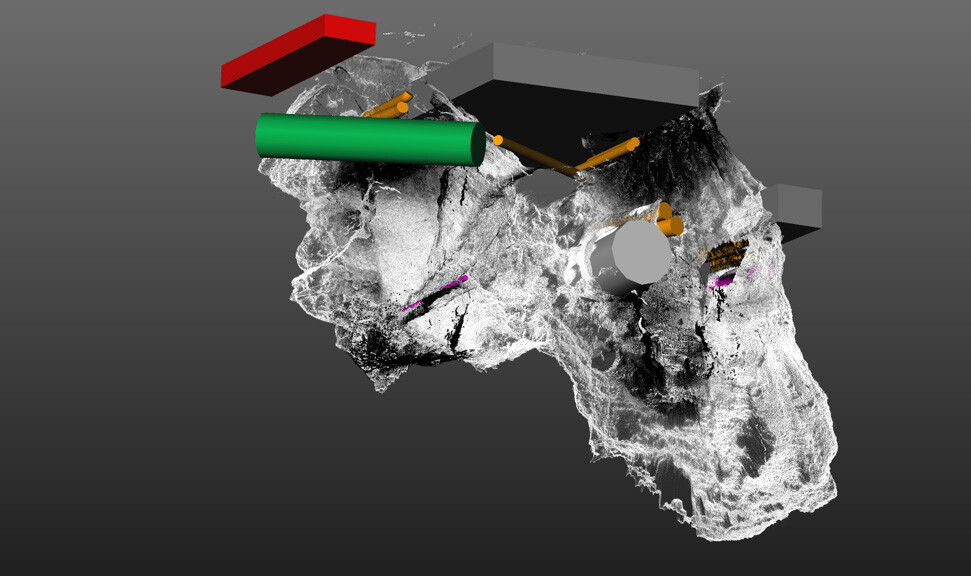 An underground LiDar scan. 3D models of dark yellow, grey, and green cylinders, as well as red and grey rectangular prisms, represent utility lines. 
