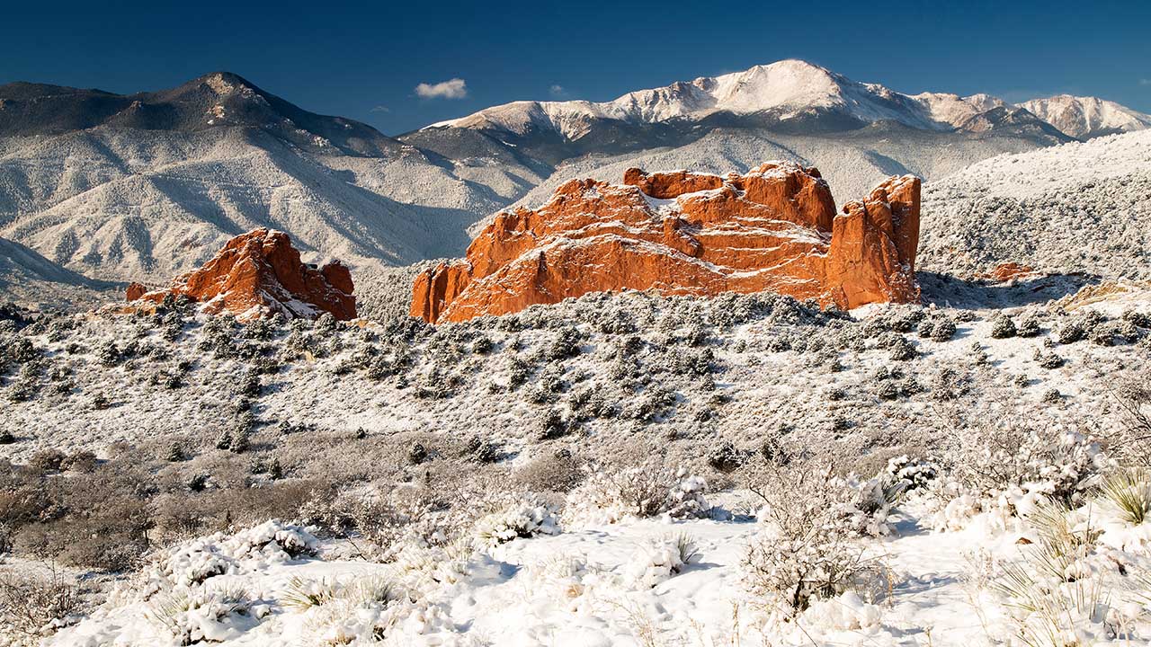Garden of the Gods and Pikes Peak covered in heavy snow.